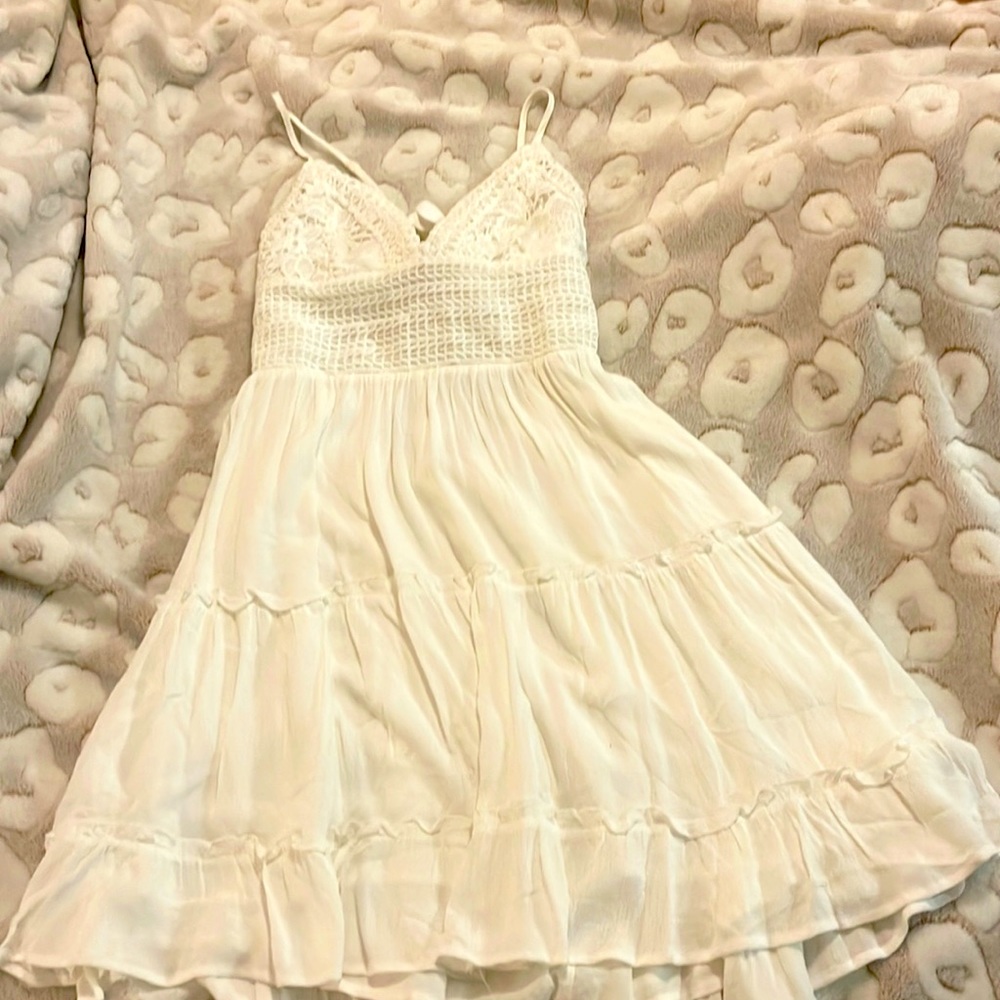 Very beautiful beige summer lace dress.  Perfect for pictures on the beach.